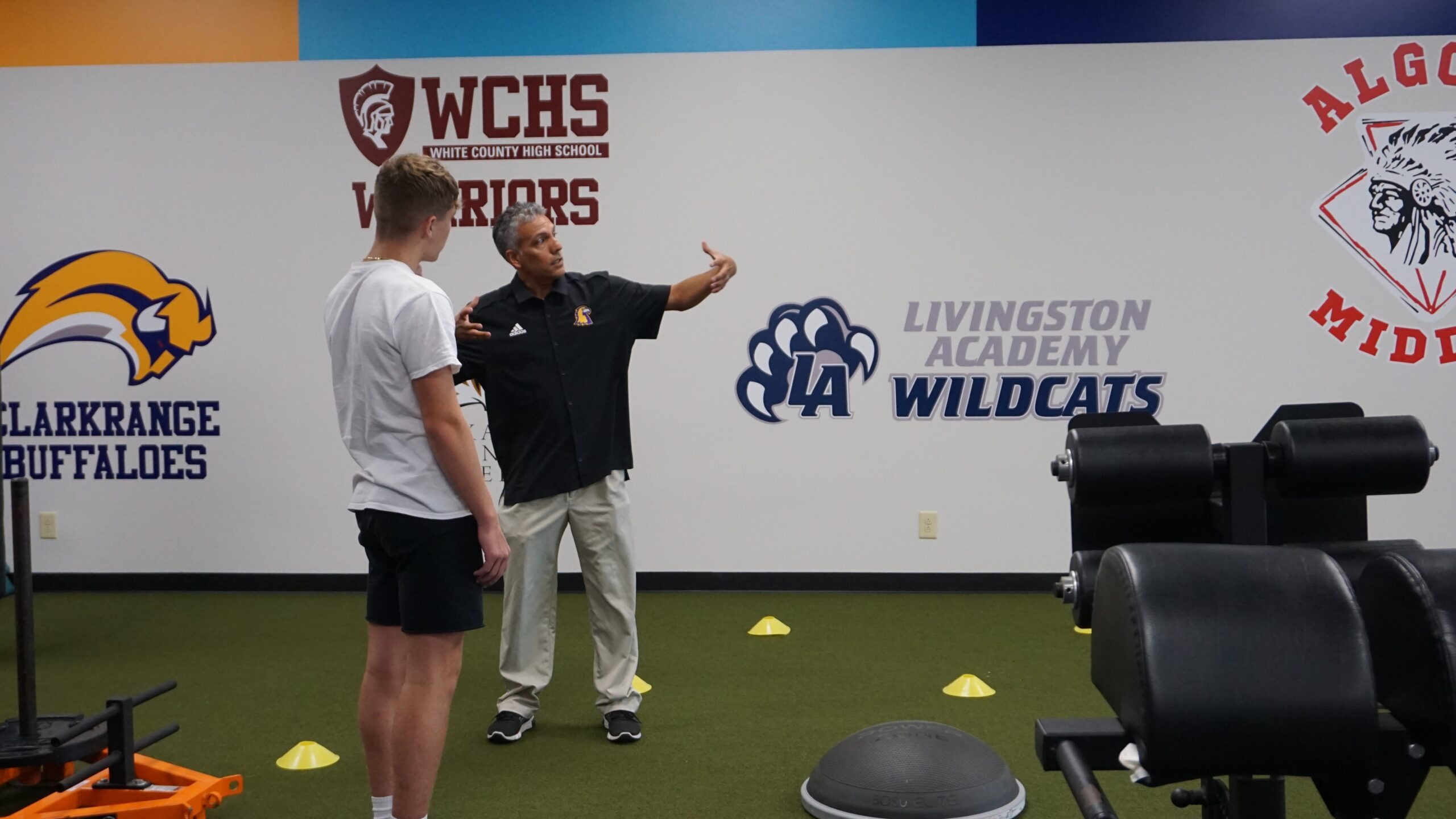 David Maldonado DPT, ATC/L, SCS, PES, Sports Physical Therapist/Athletic Trainer, works with high school student at CRMC Sports Medicine Clinic.